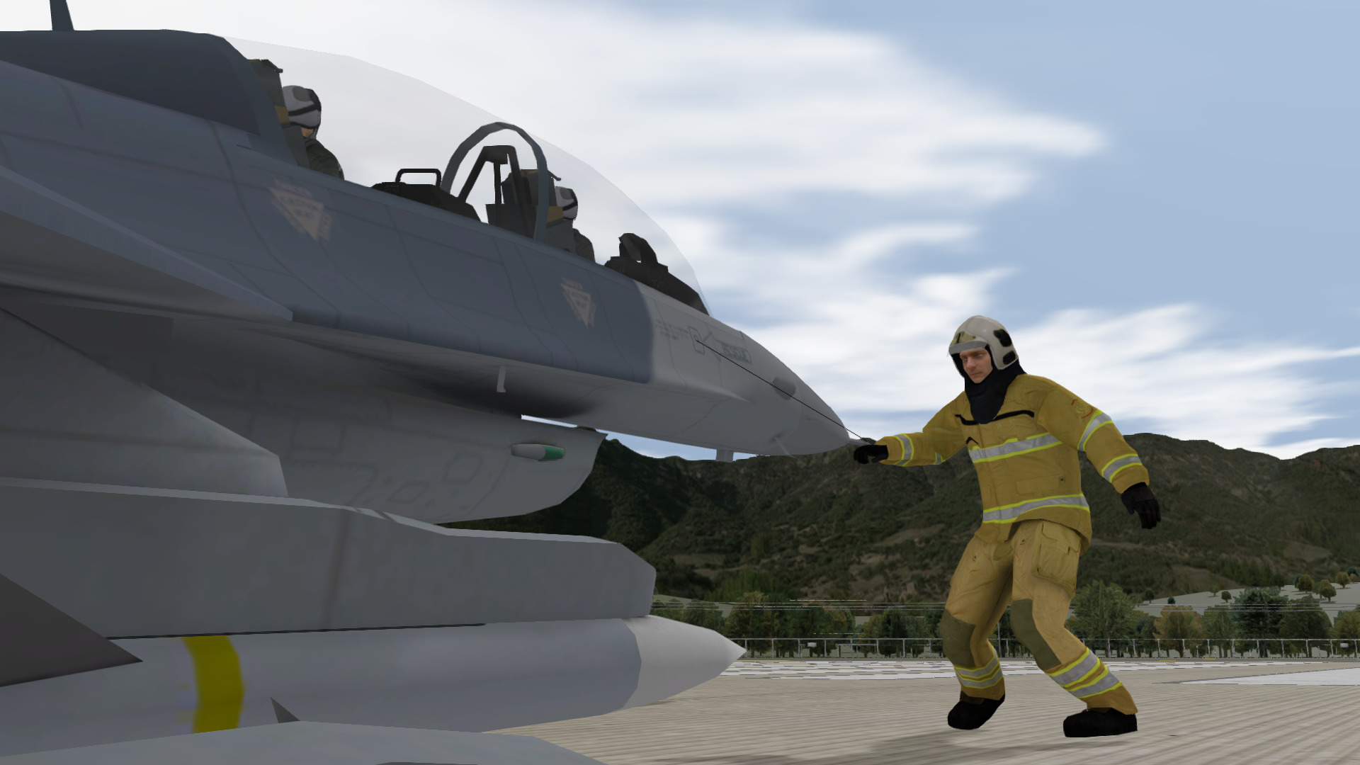 Firefighter jettisons the F-16 Canopy to extract the pilot during simulation training of emergency procedures.
