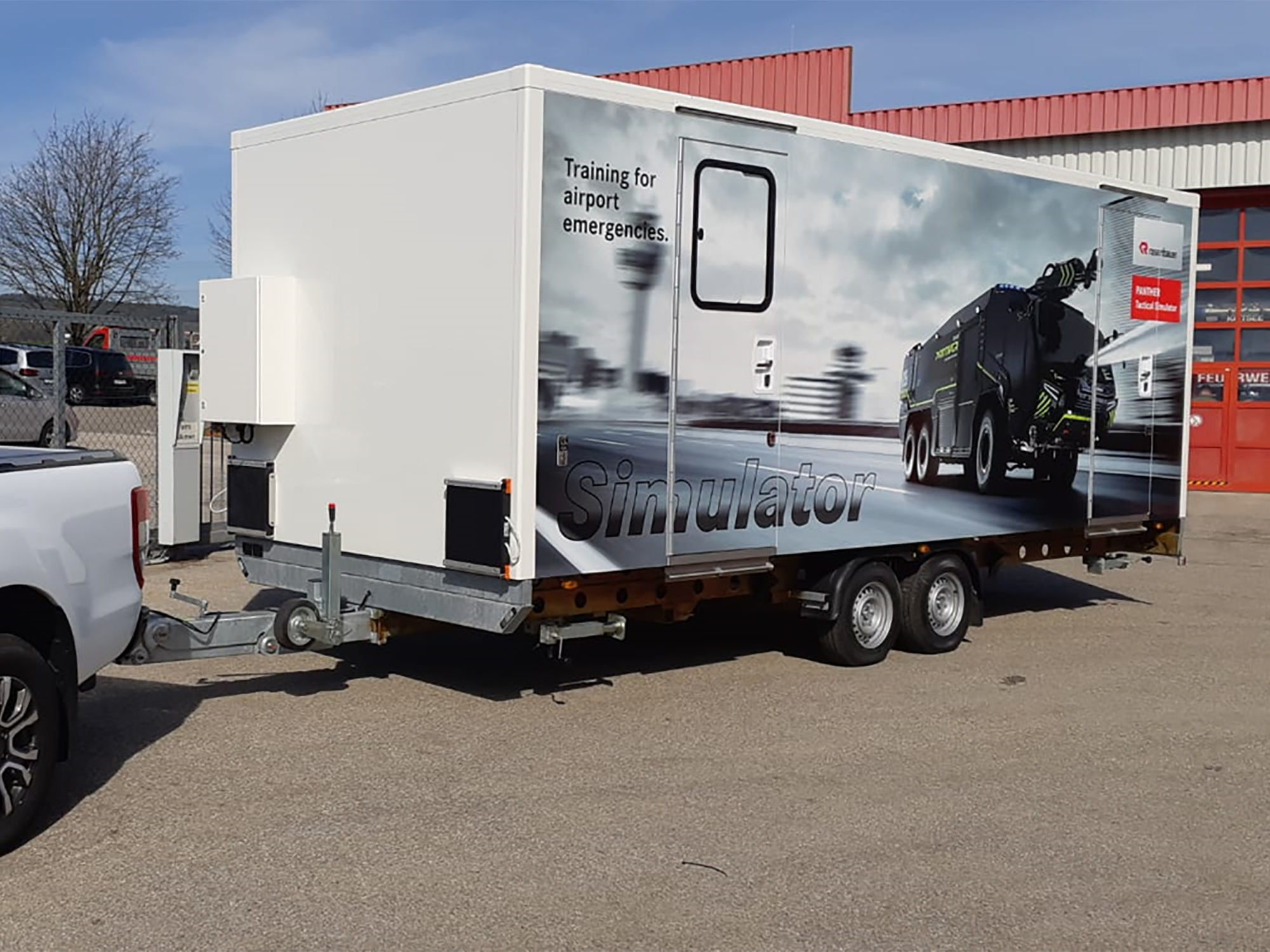 ARFF and Drive Simulator with original dashboard combined with an instructor station installed in a trailer.