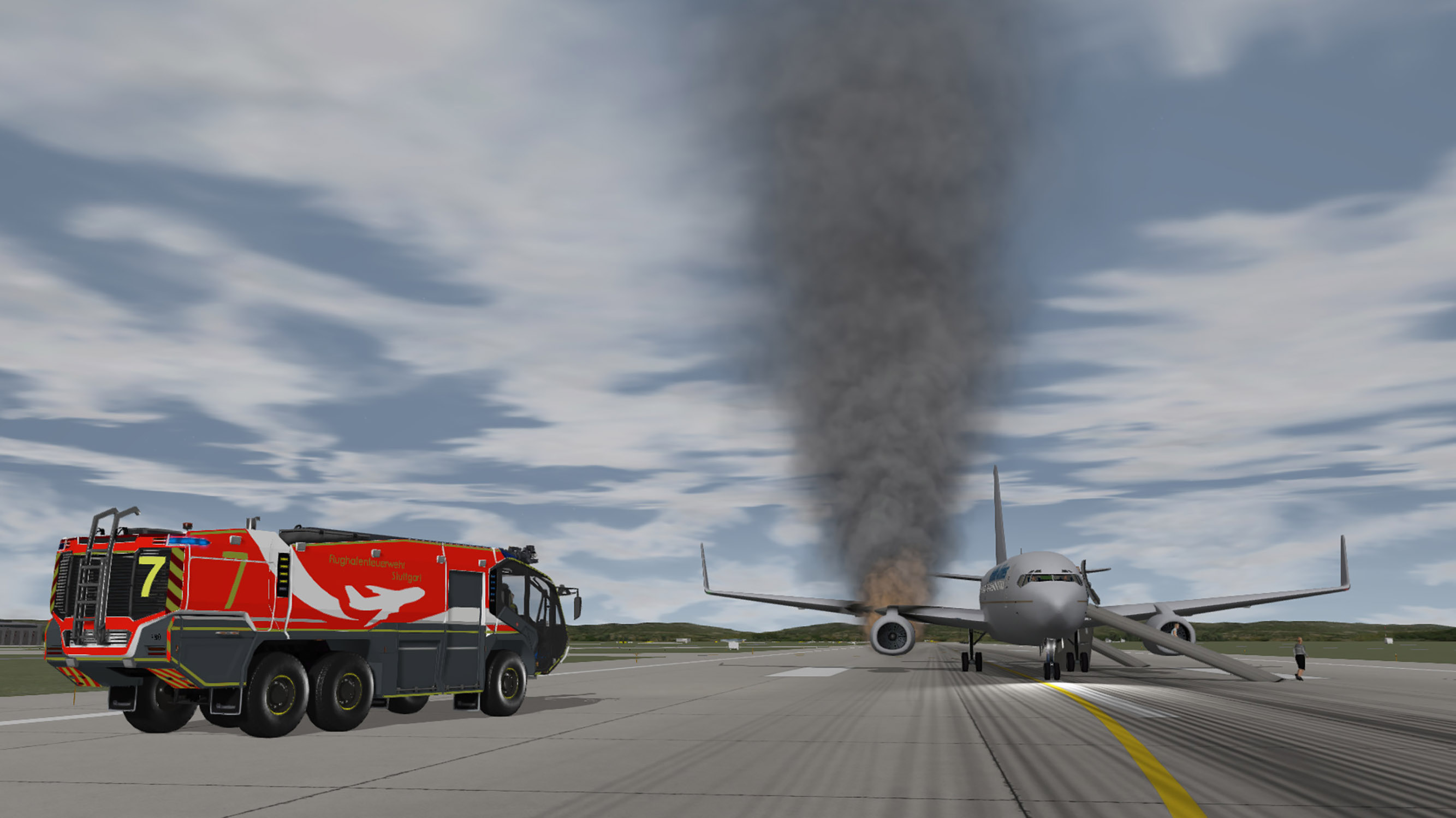 ARFF truck on scene of an aircraft engine fire with passengers evacuation on the runway.